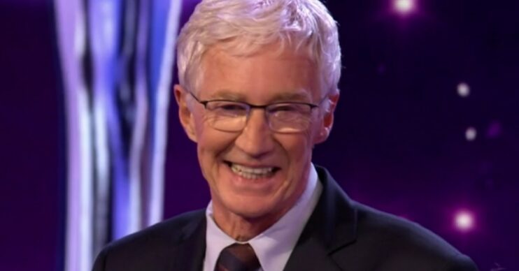 Paul O'Grady smiling on stage at the Pride of Britain Awards 2022