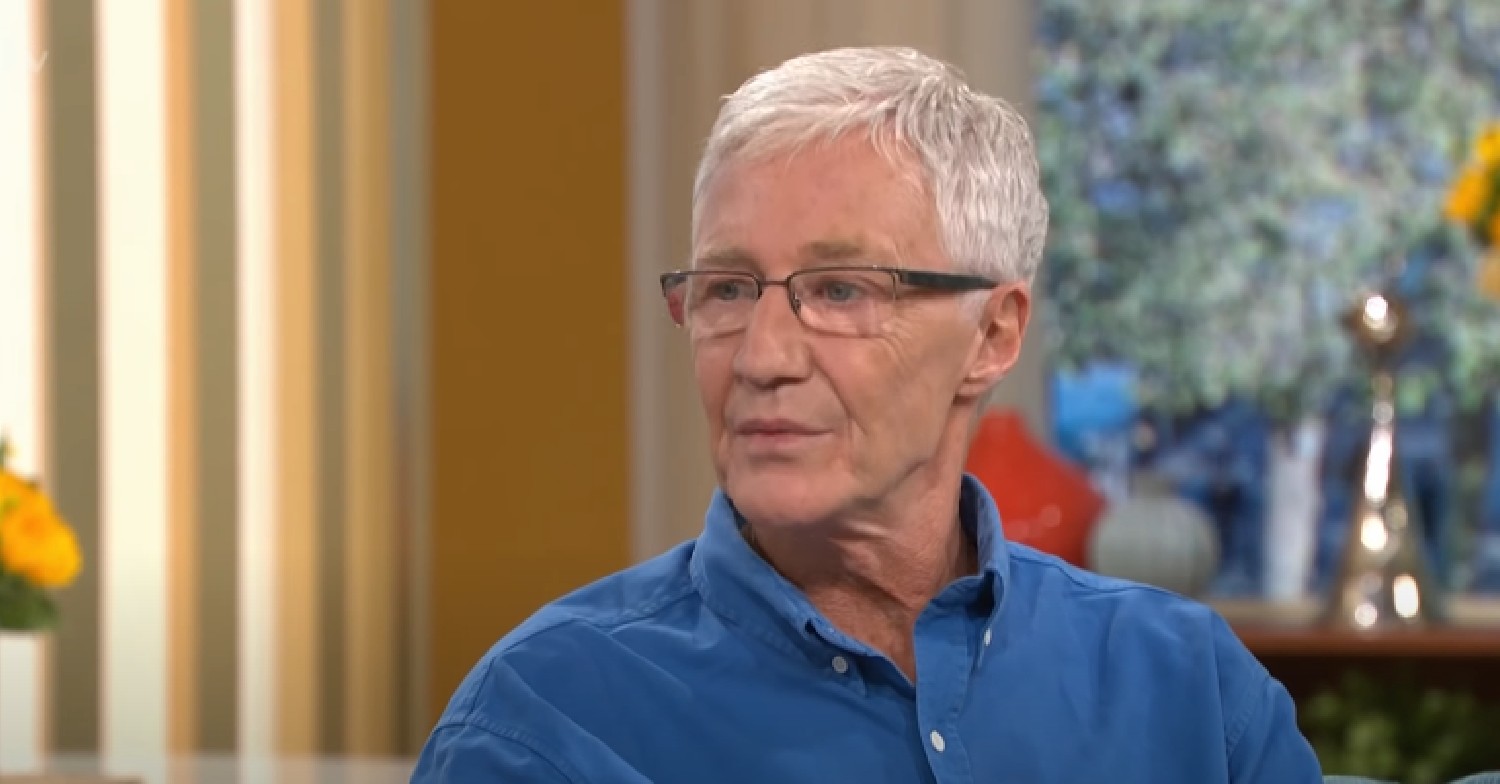 Paul O'Grady in blue shirt and talking during This Morning interview
