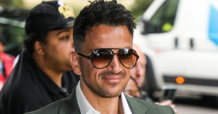 Peter Andre smiling with sunglasses on at TRIC Awards