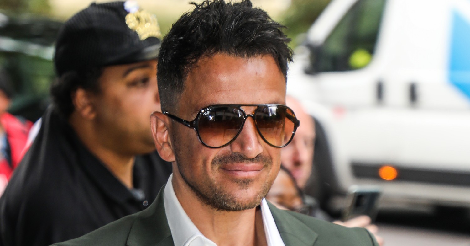 Peter Andre smiling with sunglasses on at TRIC Awards