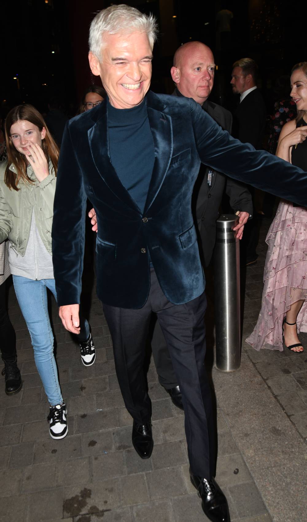 Phillip Schofield beams as he leaves the NTAs