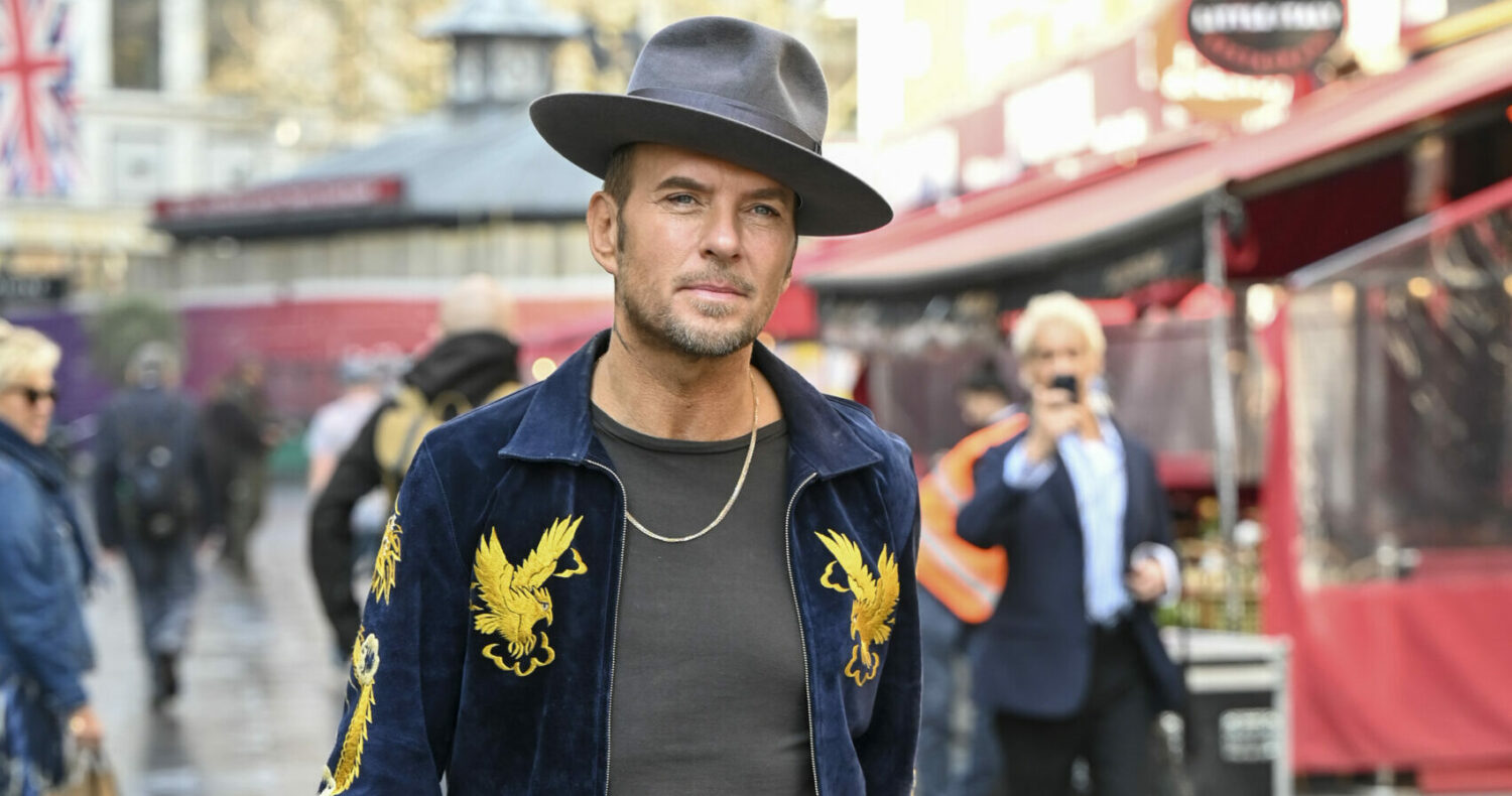 Matt Goss wearing a hat during outing