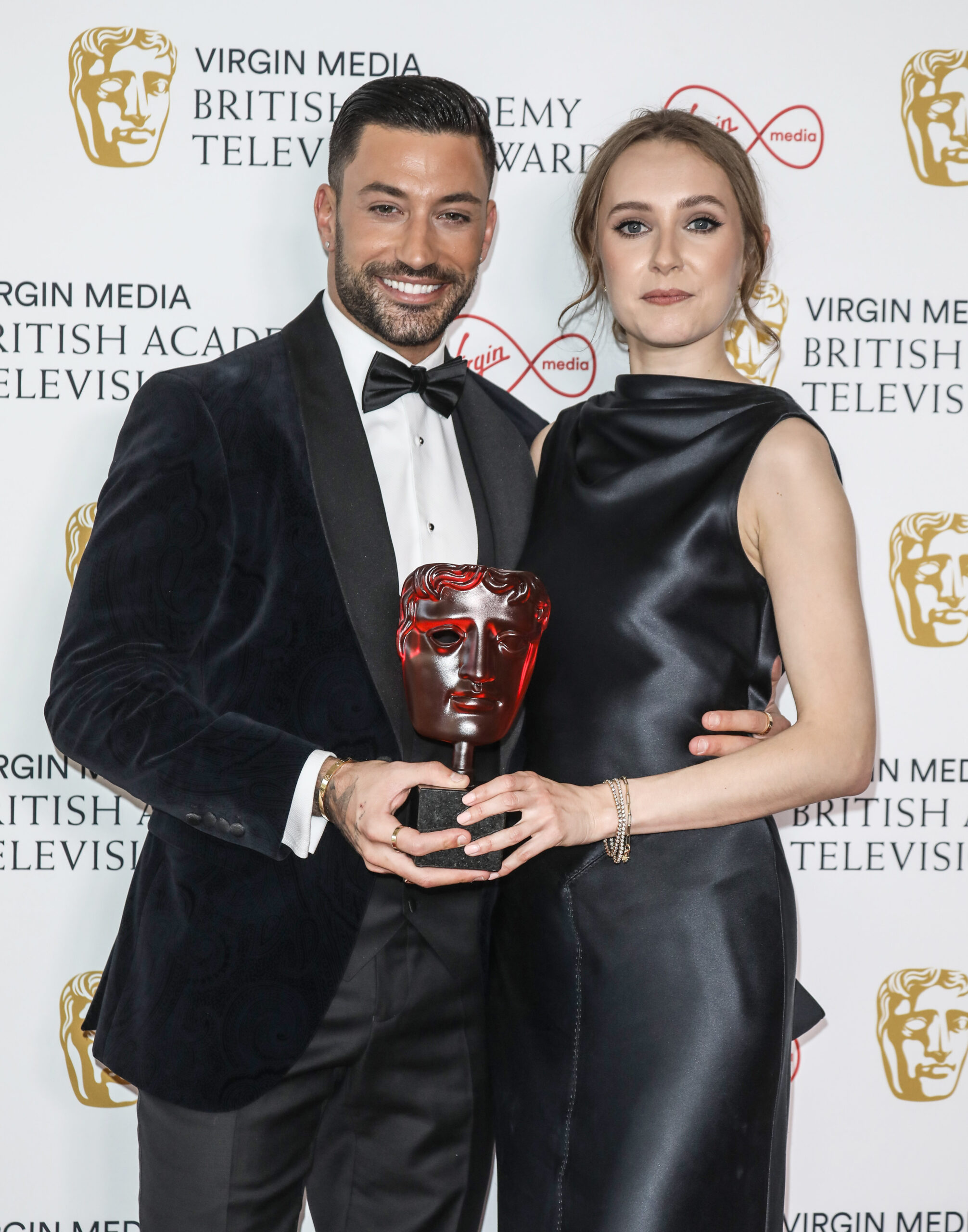 Rose Ayling-Ellis and Giovanni Pernice smiling at BAFTAs