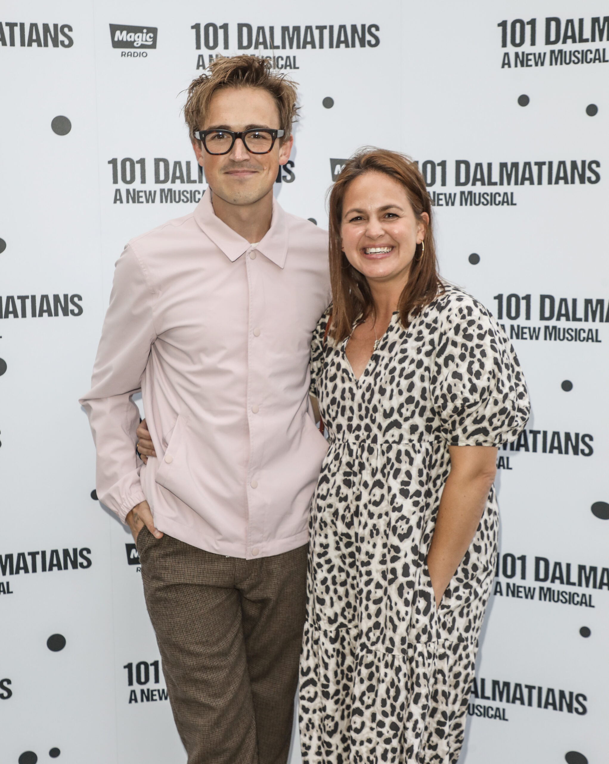 Tom Fletcher and wife Giovanna on the red carpet smiling