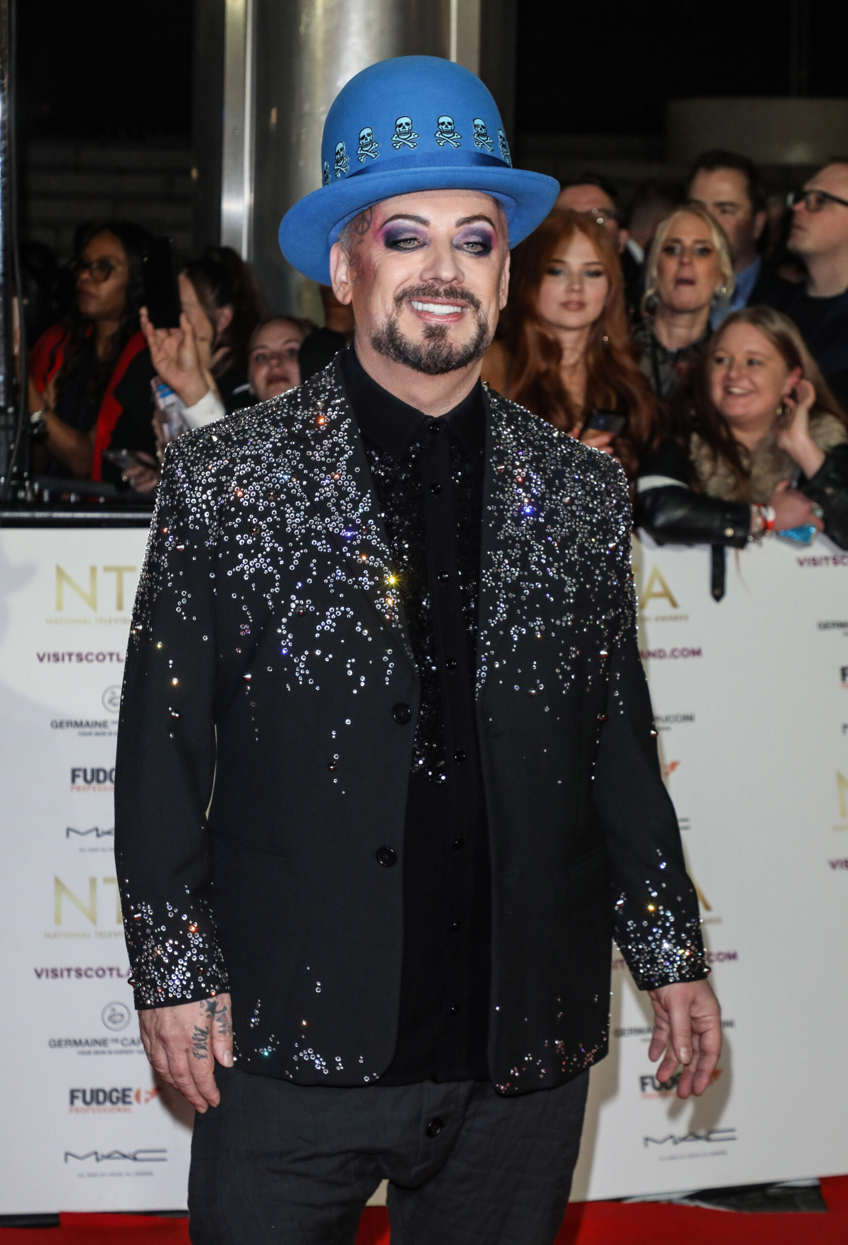 Boy George in a blue hat at the NTAs