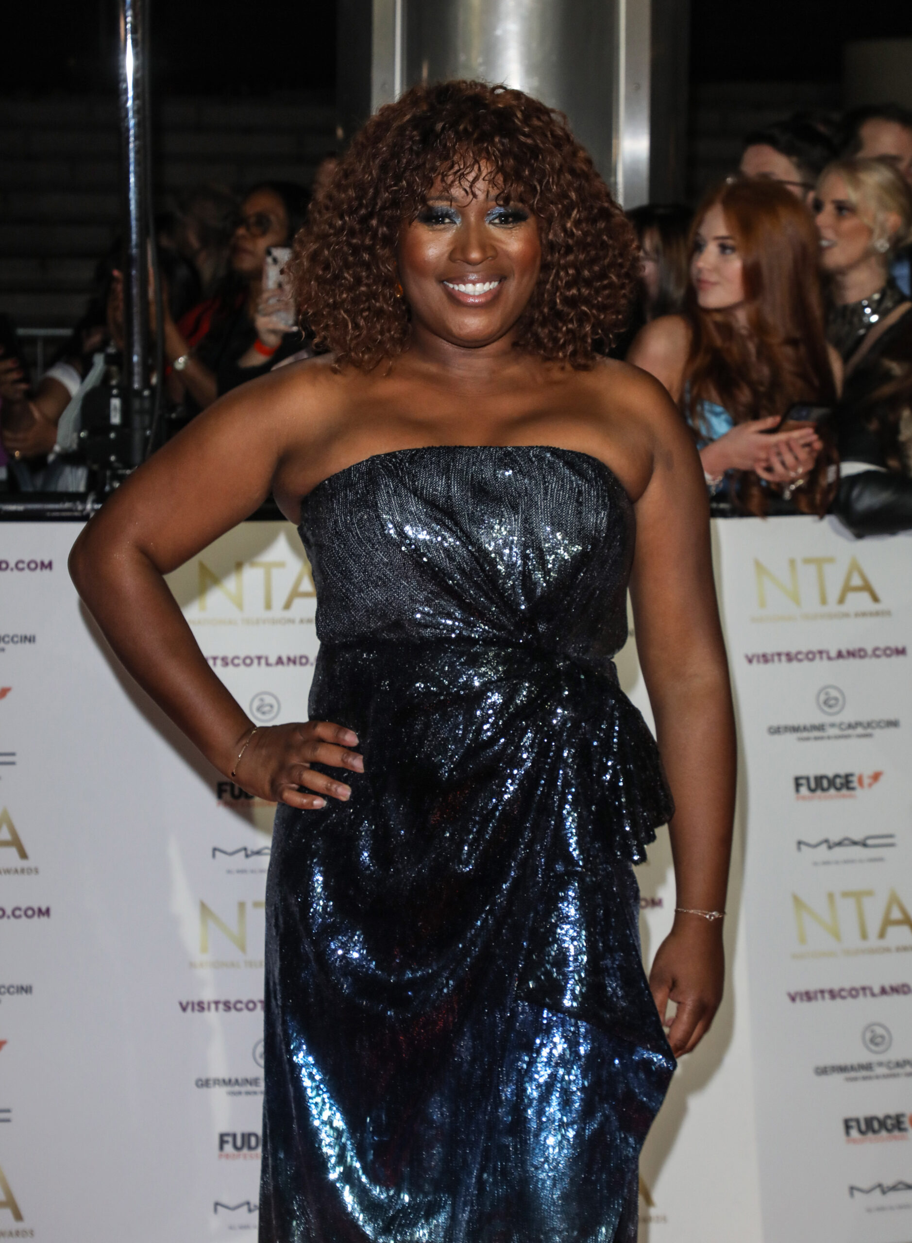 Charlene White wearing an off-the-shoulder dress at the NTAs