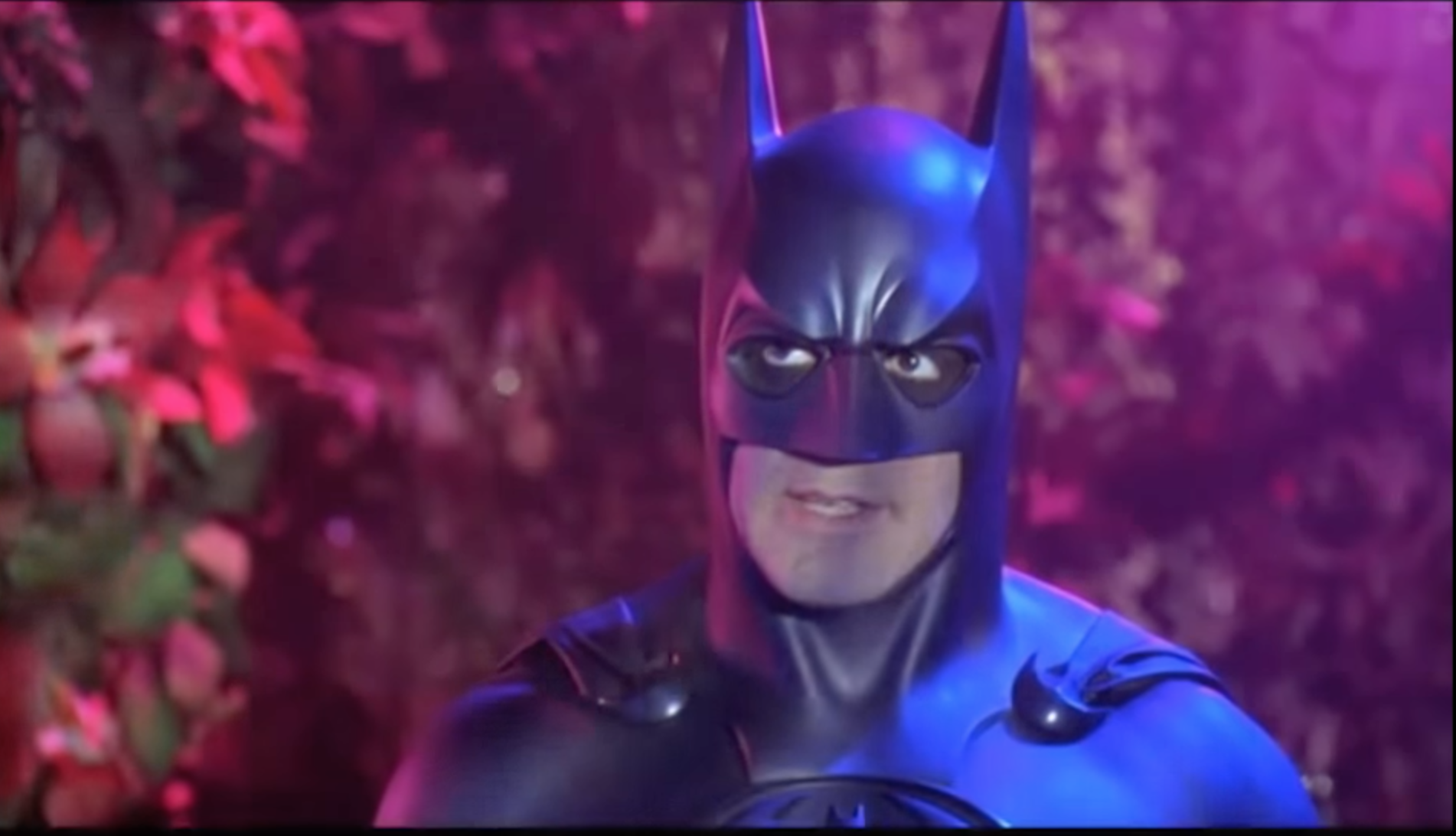 George Clooney as Batman in a mask