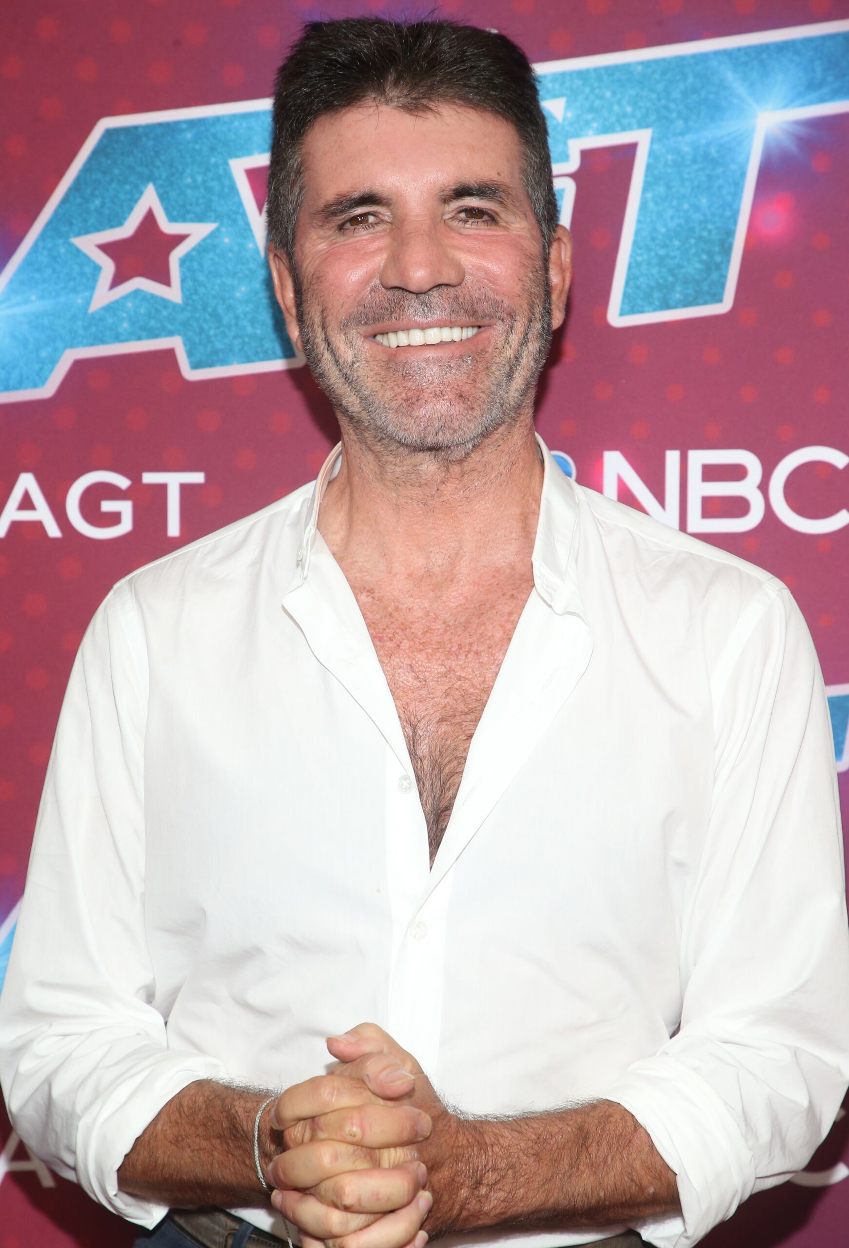 Simon Cowell smiling at America's Got Talent