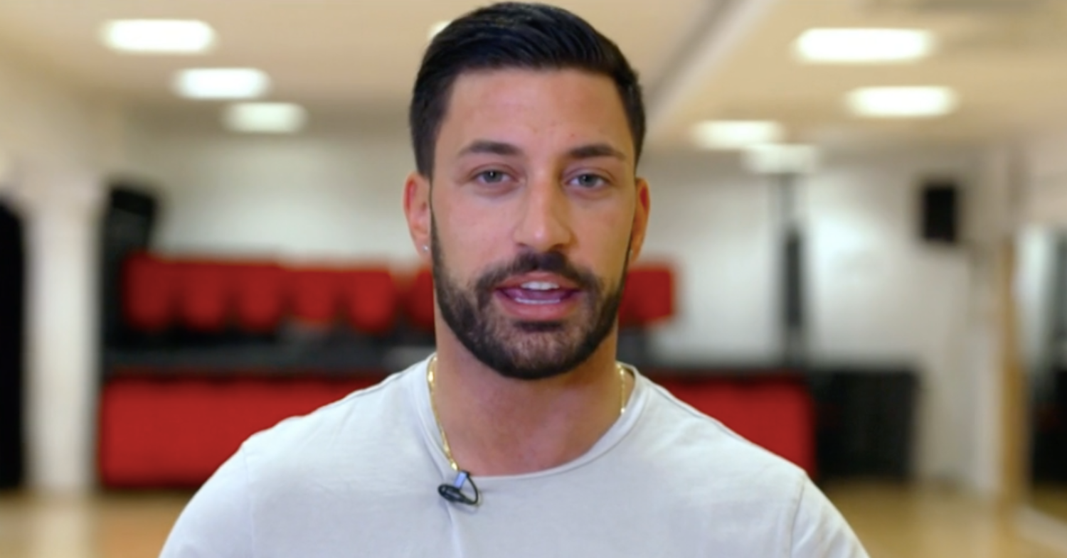 Giovanni Pernice speaking to camera during rehearsals for Strictly