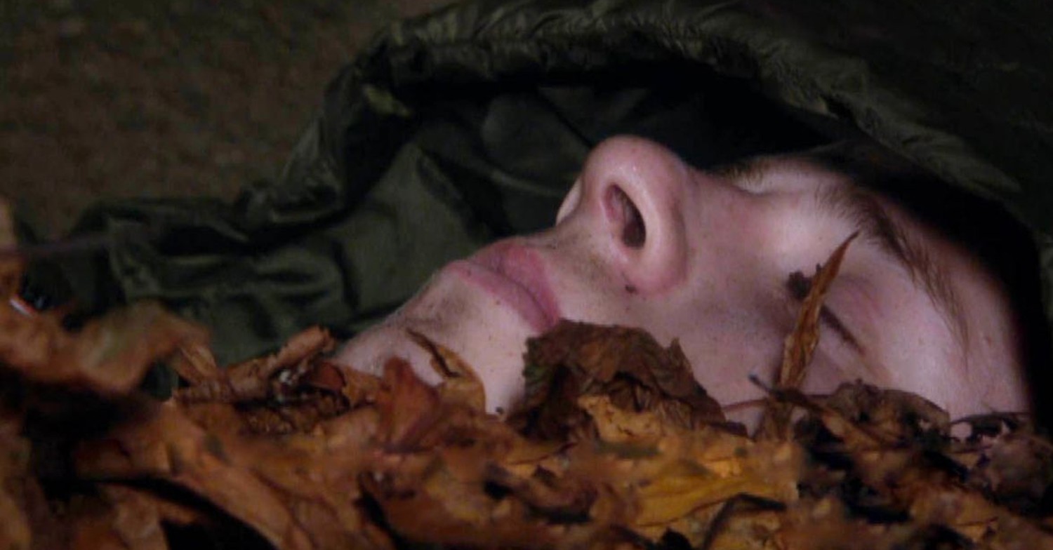 Samson Dingle covered in leaves in Emmerdale (Credit: ITV)