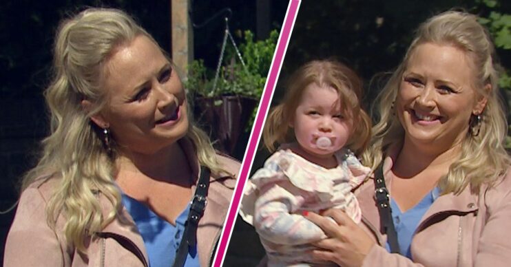 Emmerdale star Amy Walsh smiling holding a baby