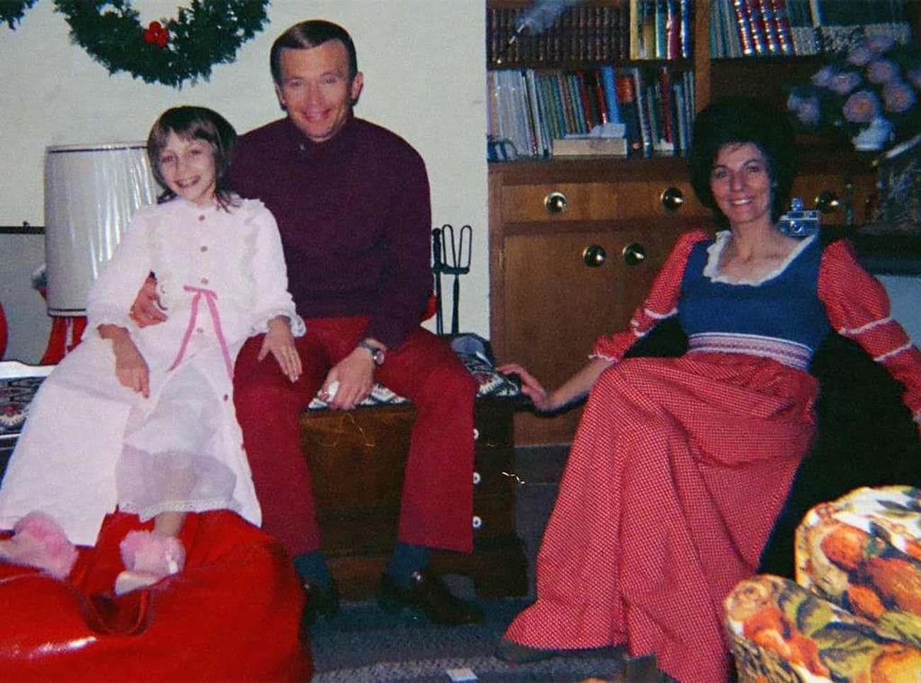 Image of Jan Broberg, Robert Berchtold and Mary Ann Broberg, they sit in a living room and smile at a camera