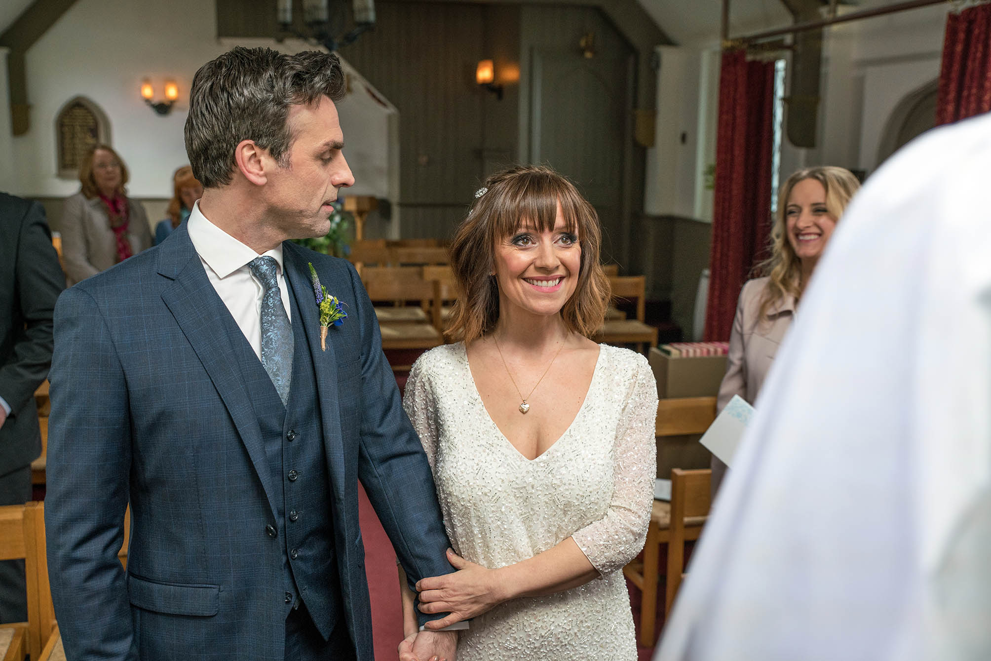 Rhona smiles as she marries Pierce Harris