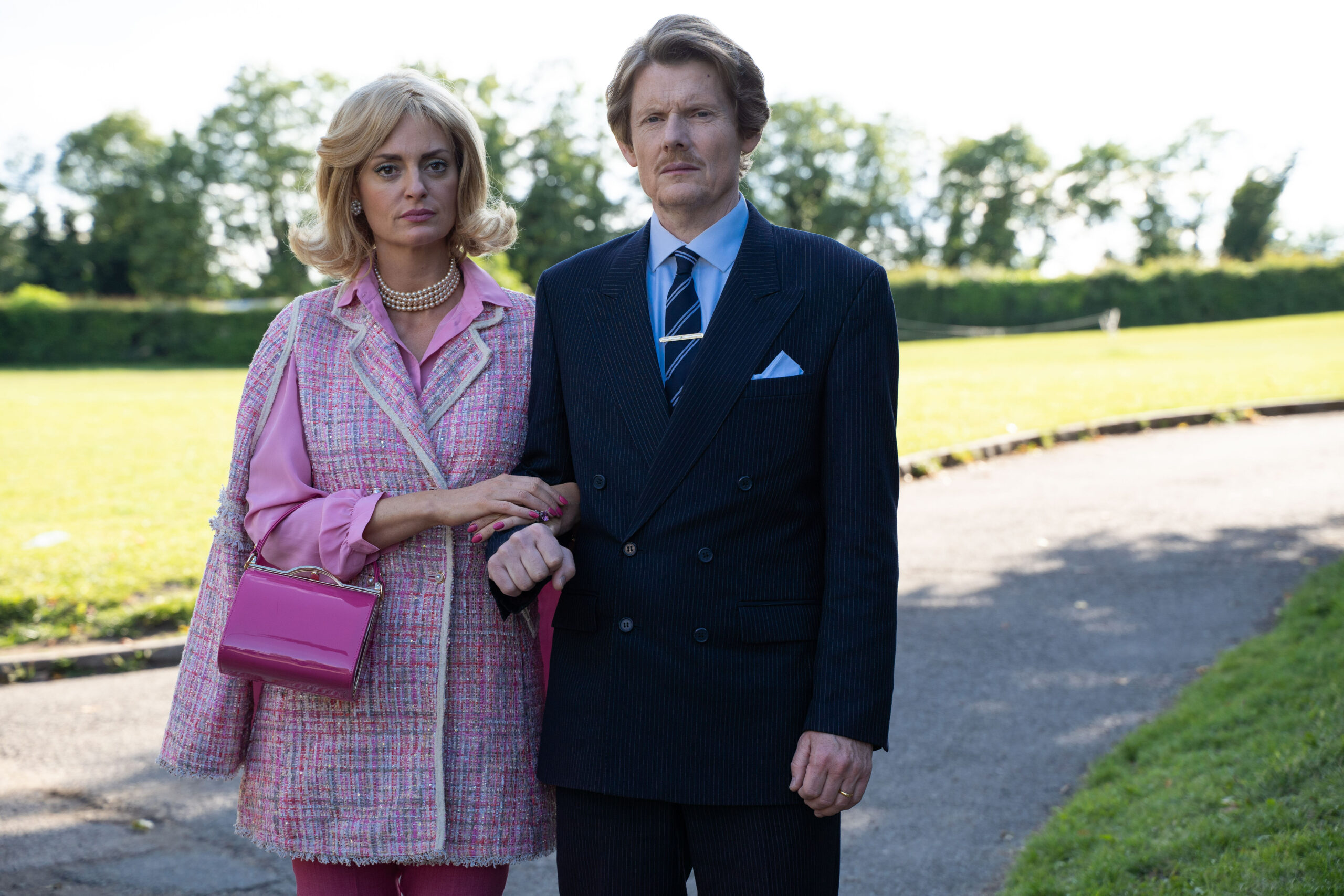 Morgana Robinson and Julian Rhind-Tutt linking arms in The Larkins