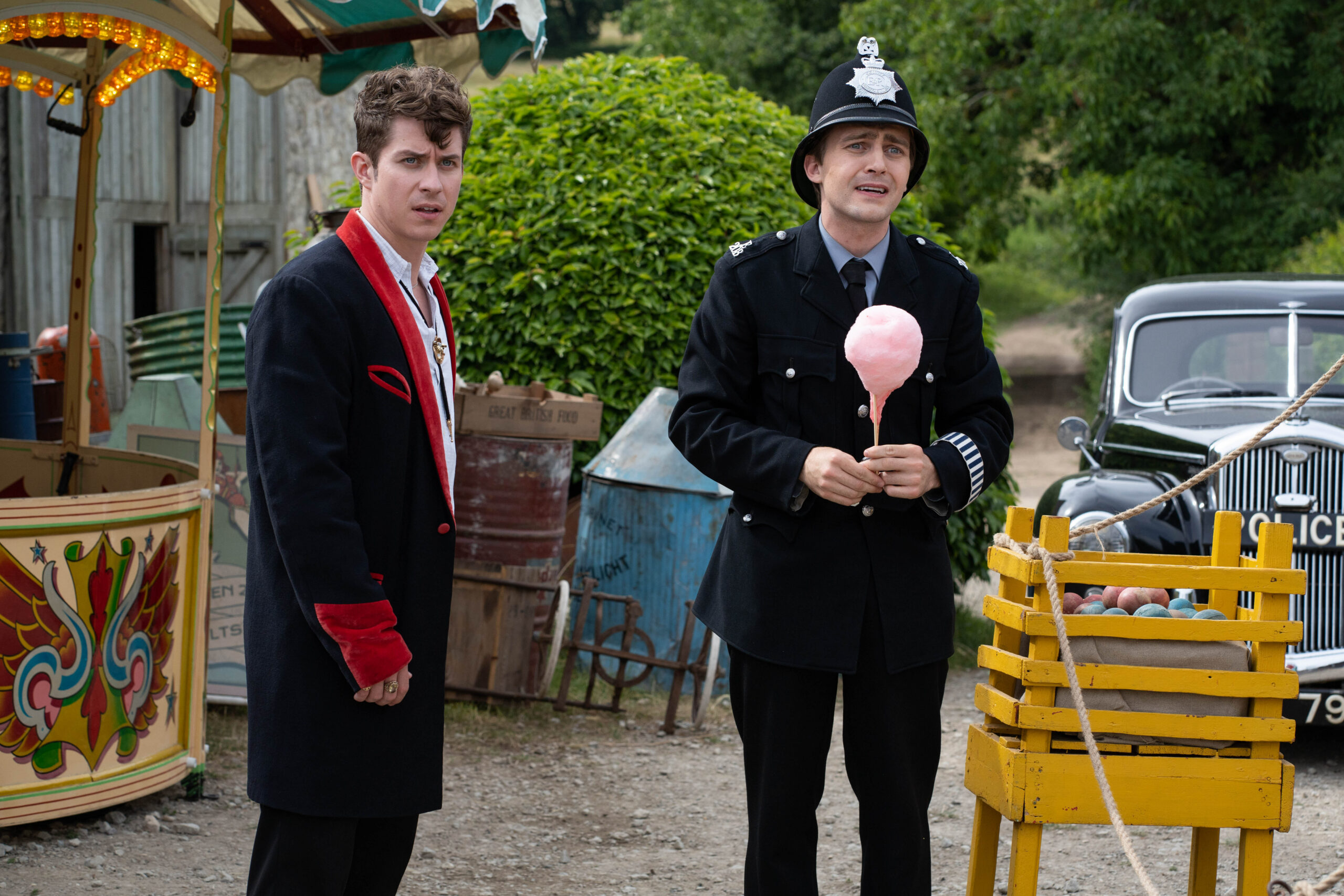 Ted [Micky Dartford] and PC Harness [Barney Walsh], penhale looks stressed as he holds candy floss in the larkins