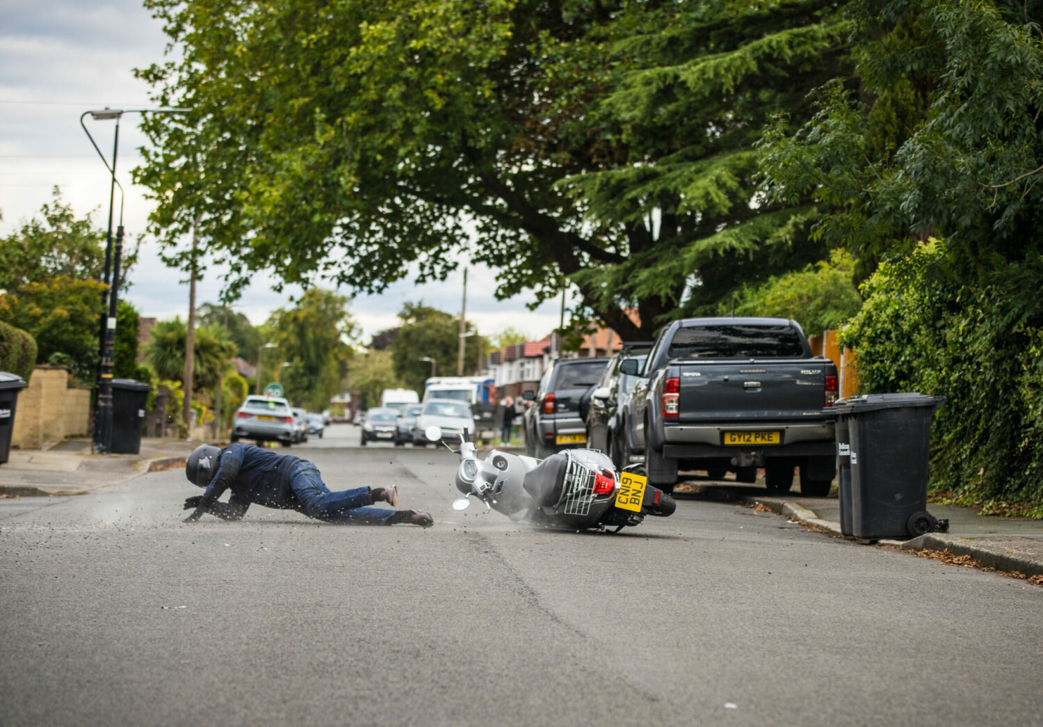 Stephen Reid falls off his moped in a dramatic crash