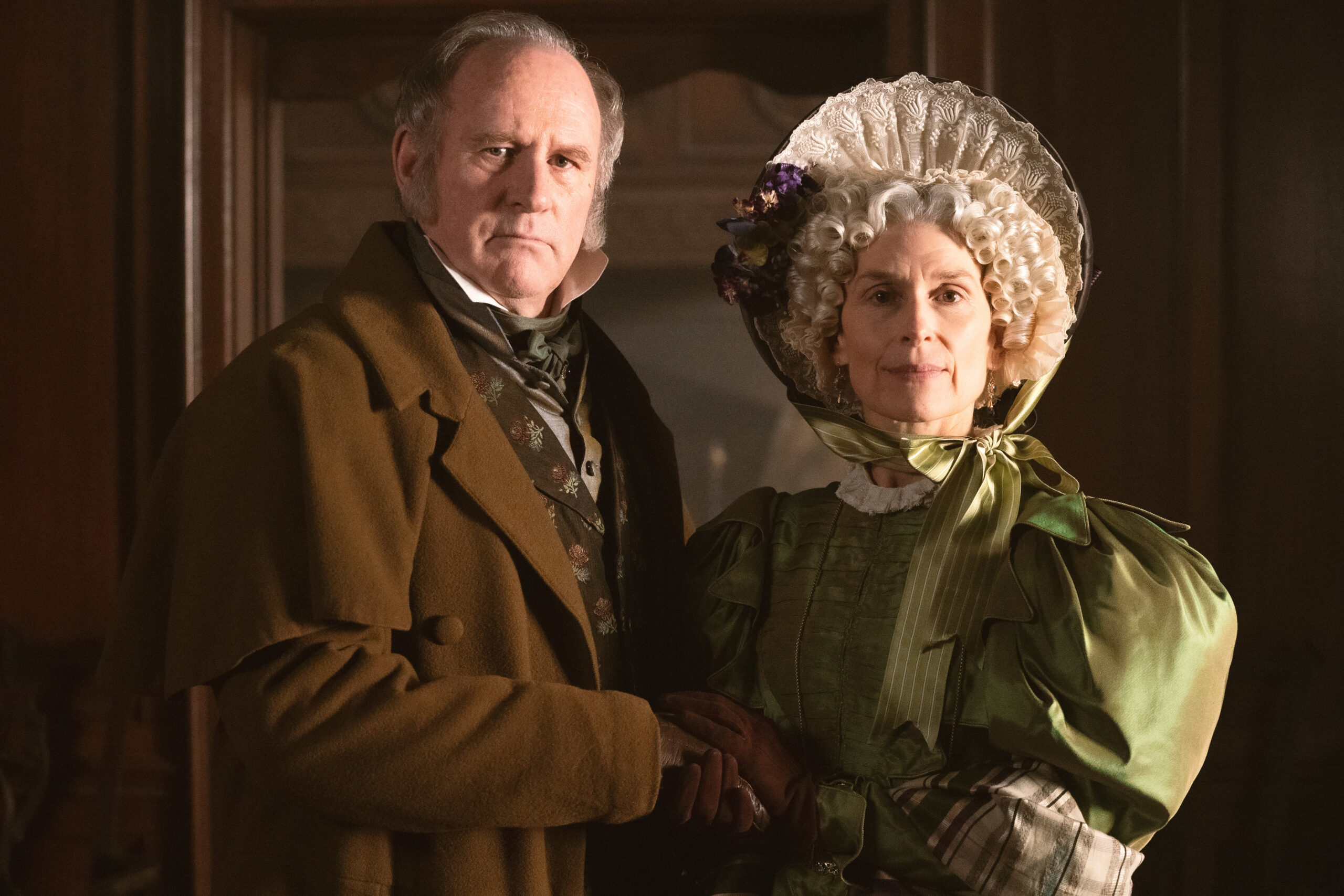 Amelia Bullmore locking arms with Pete Davison in Gentleman Jack
