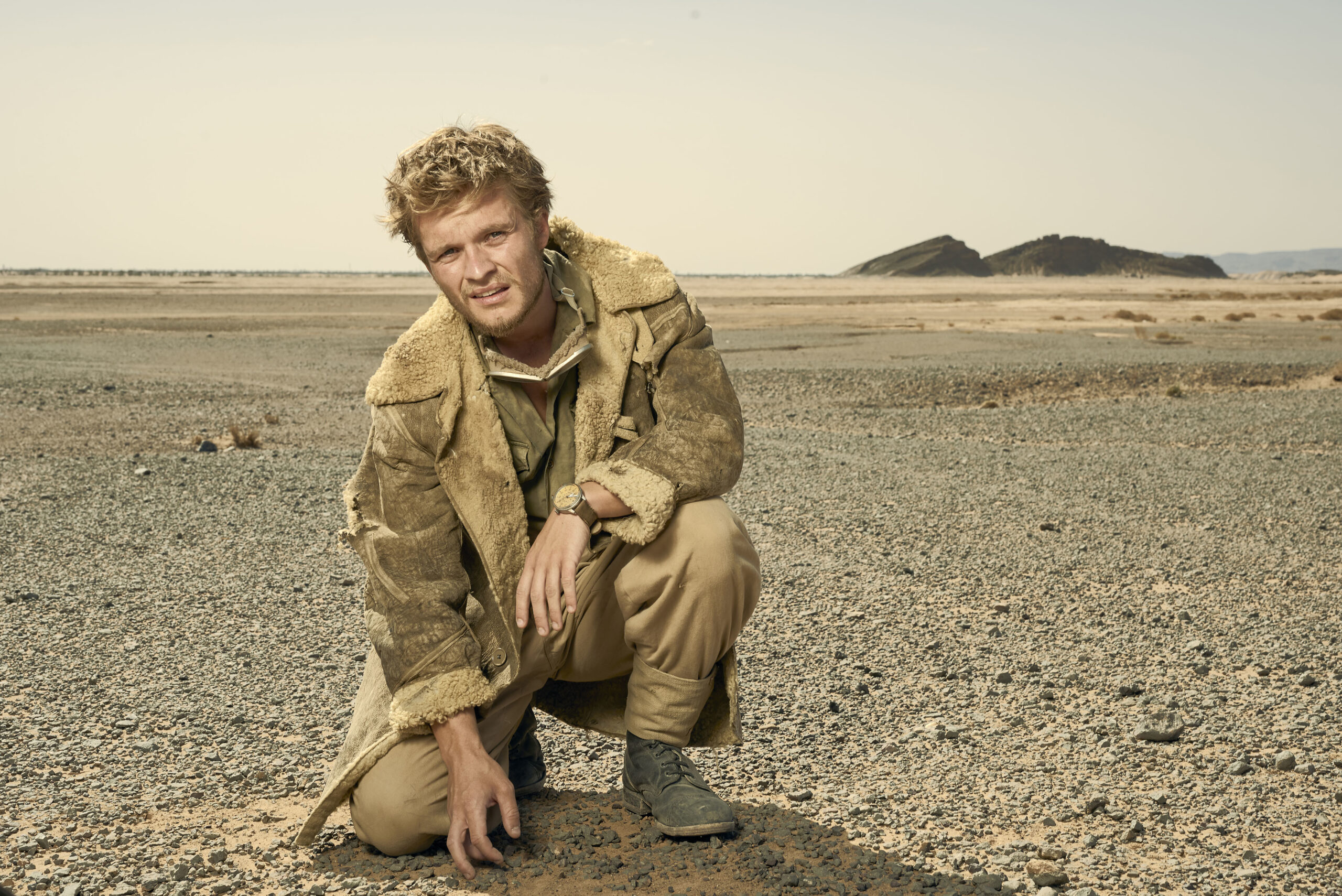 Tom Glynn-Carney posing in the desert