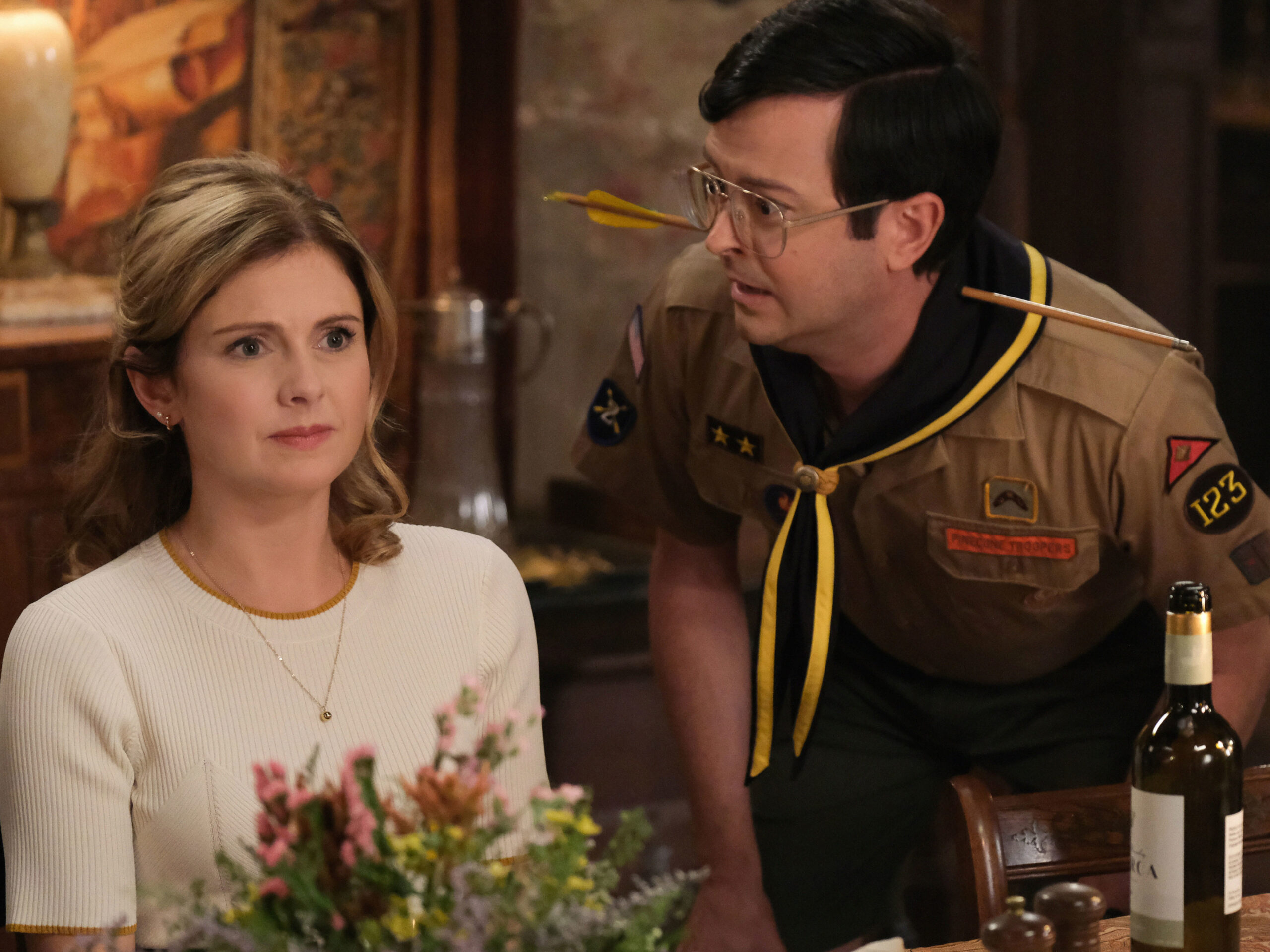 Pete tries to talk to Sam at the table in Ghosts US