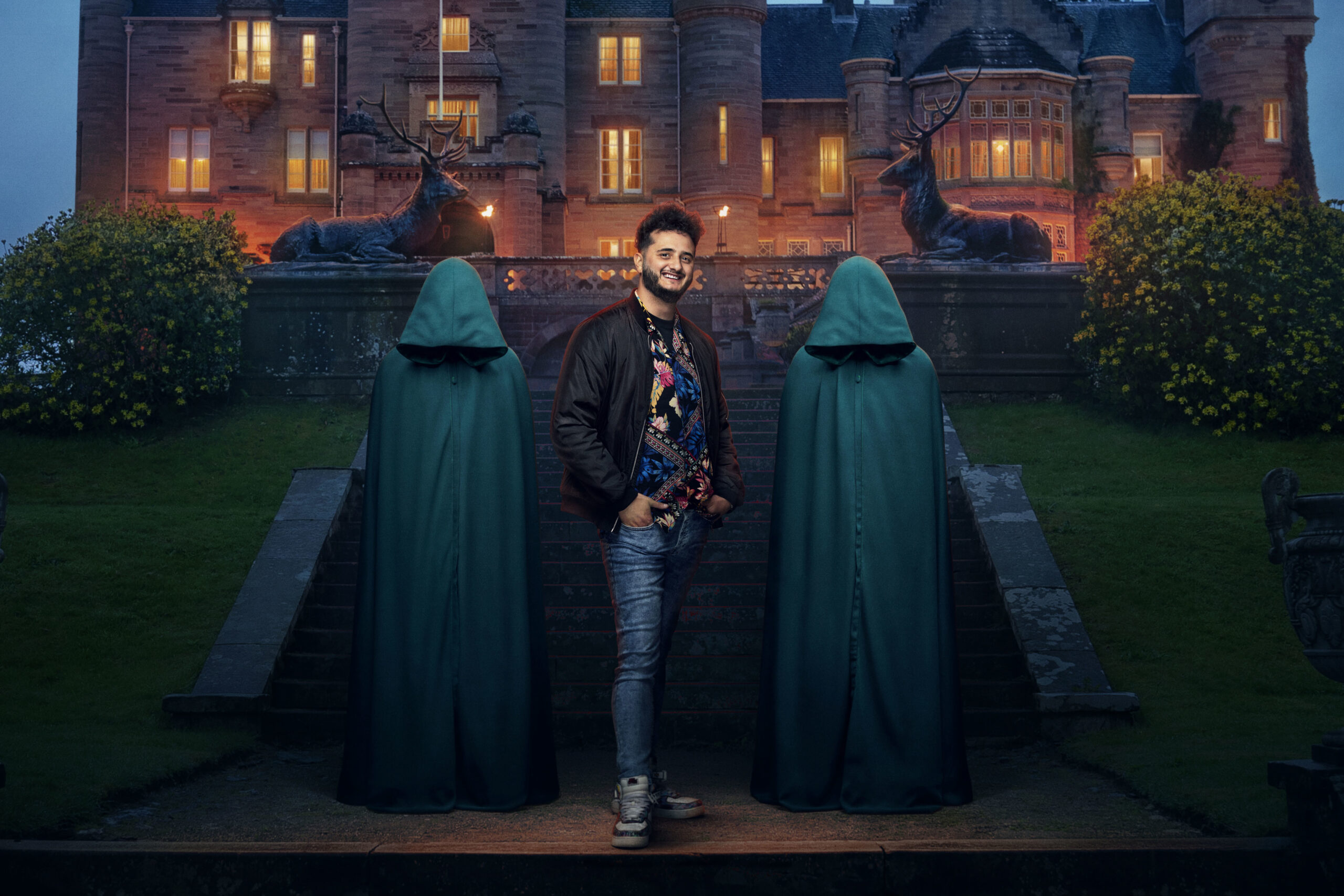 Wilfred stands between The Traitors