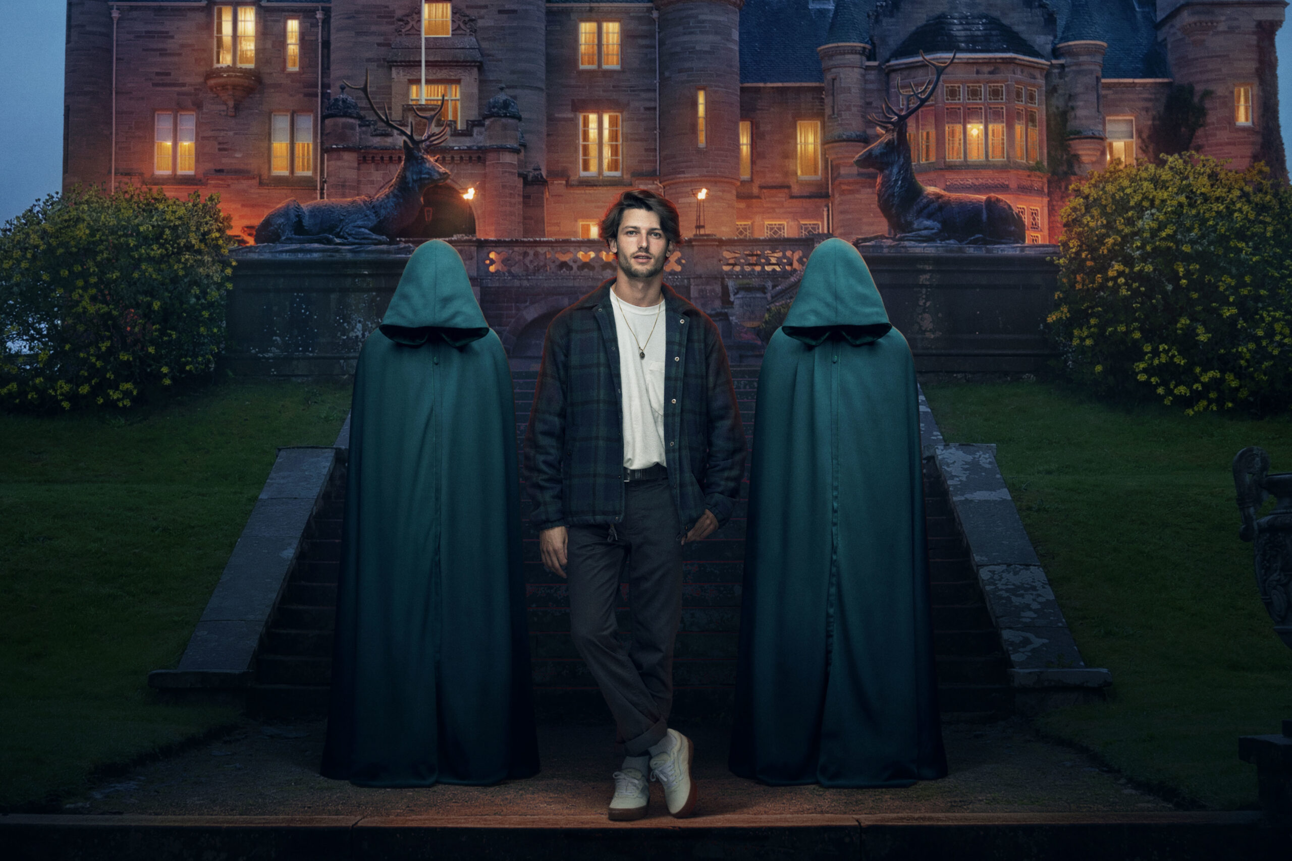 Matt stands between the two hoods