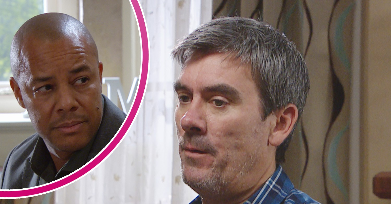 Al looking worried and Cain looking annoyed in Emmerdale