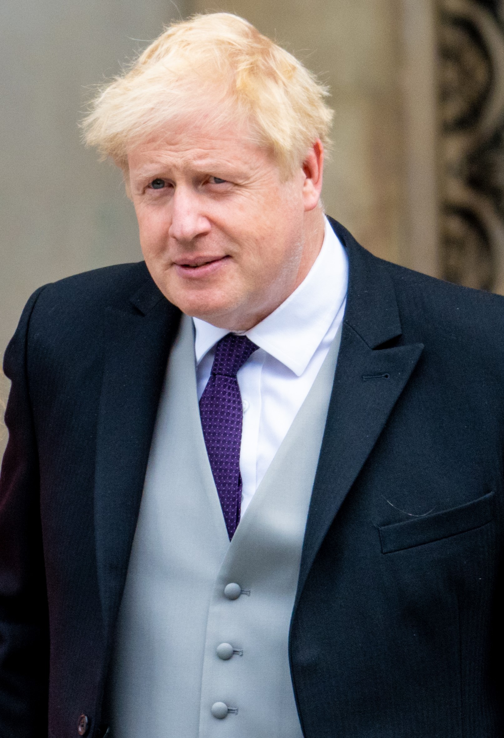 Boris Johnson smiling at royal service