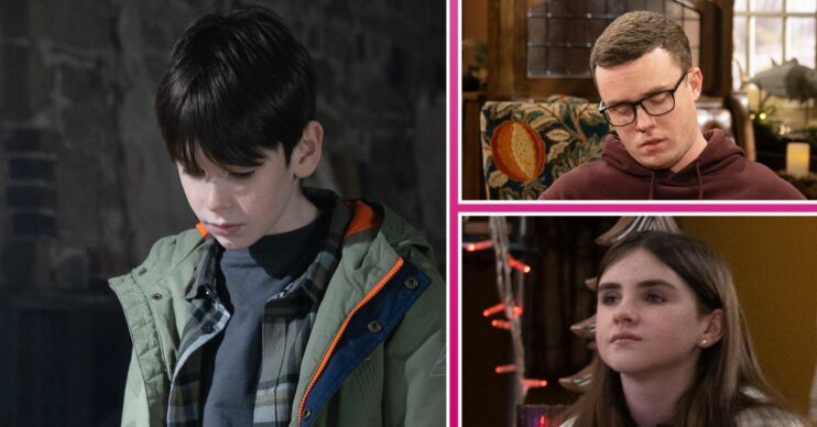 Kyle looking down, Vinny looking intrigued and April looking annoyed in Emmerdale