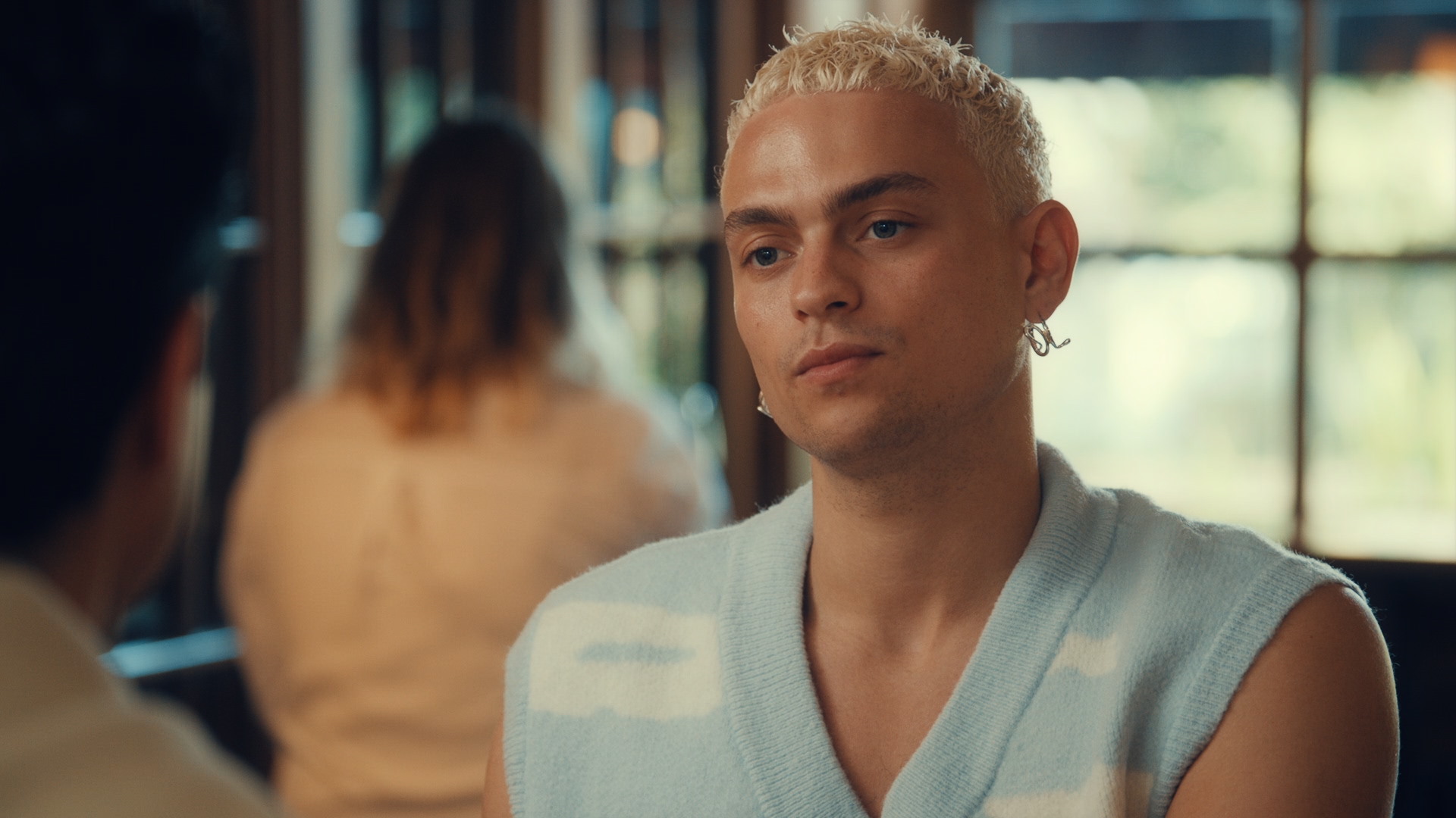 Joel Mignott wearing a blue vest in Made In Chelsea