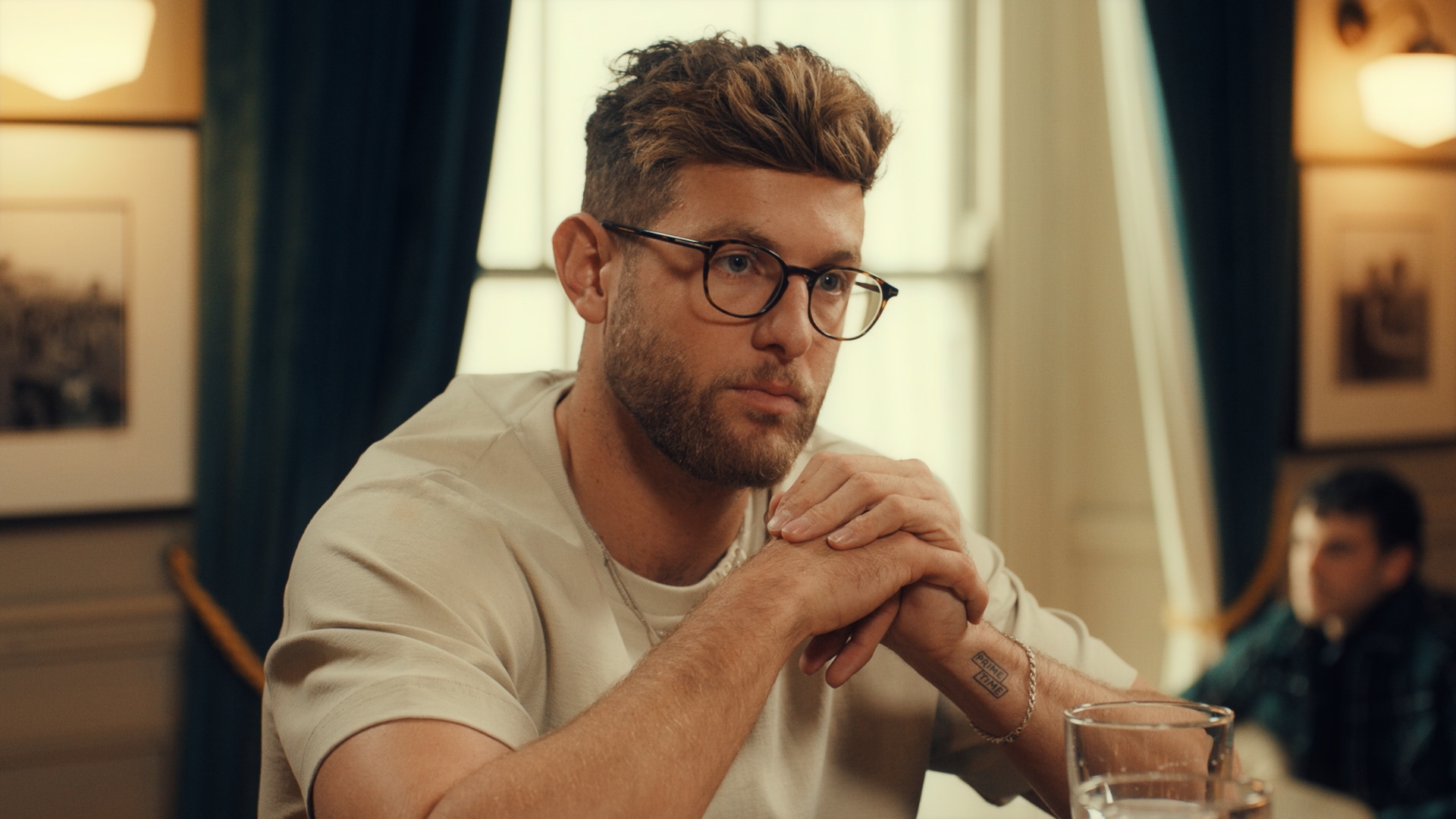 Harvey crossing his hands in Made In Chelsea