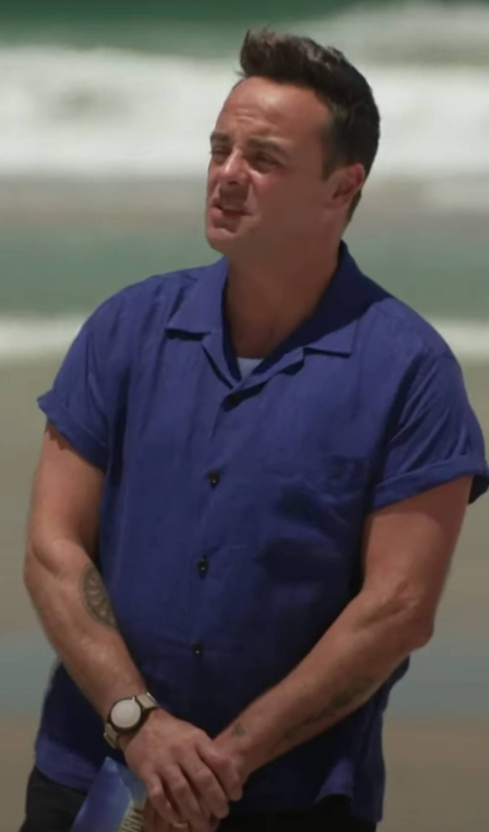 I'm A Celebrity host Ant McPartlin hold his wrist