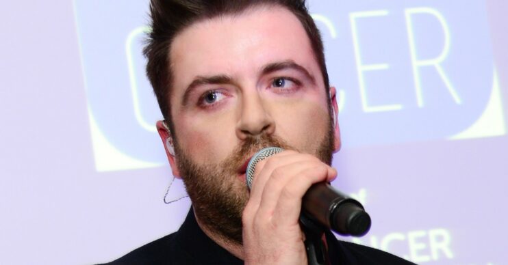 Mark Feehily with Westlife on-stage