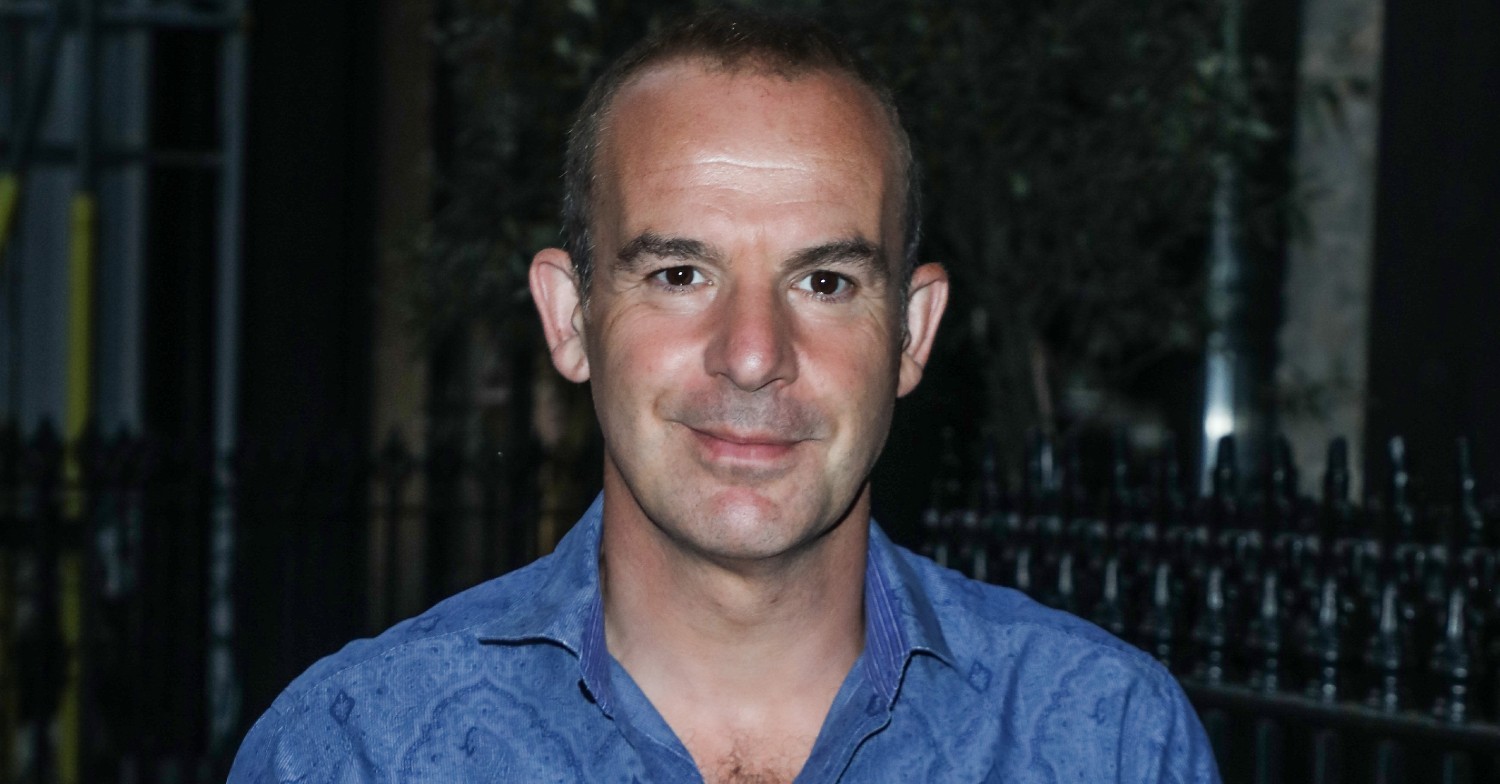 Martin Lewis wearing blue shirt