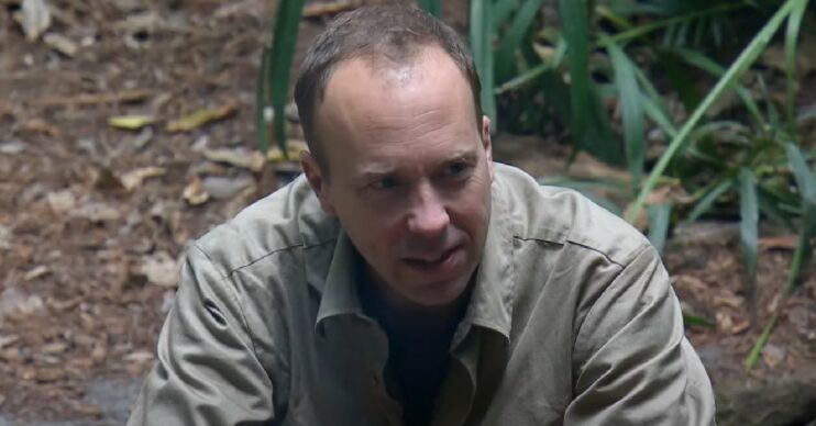Matt Hancock smiling in the I'm A Celebrity camp