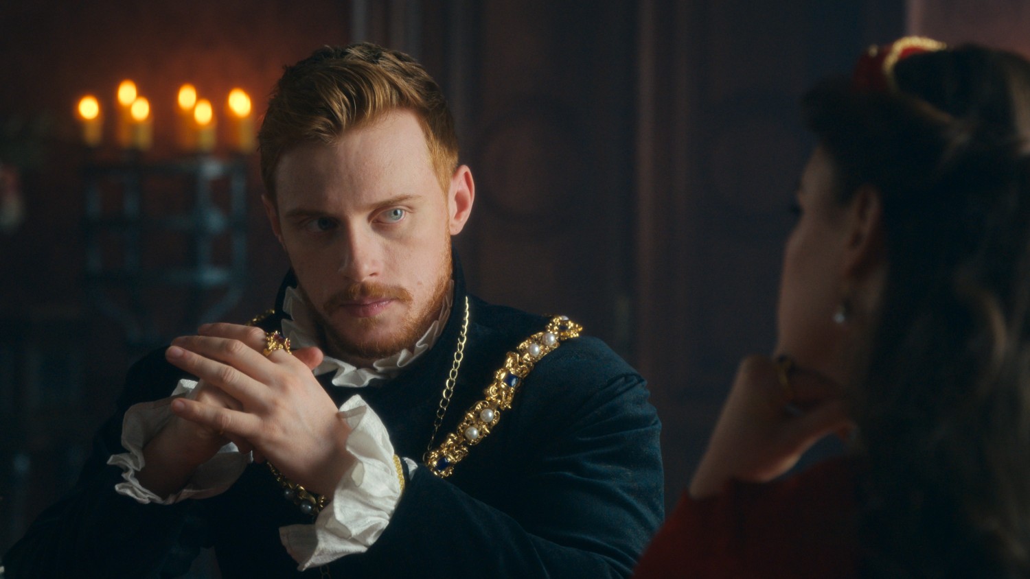 Max Parker crossing his hands in Blood, Sex & Royalty