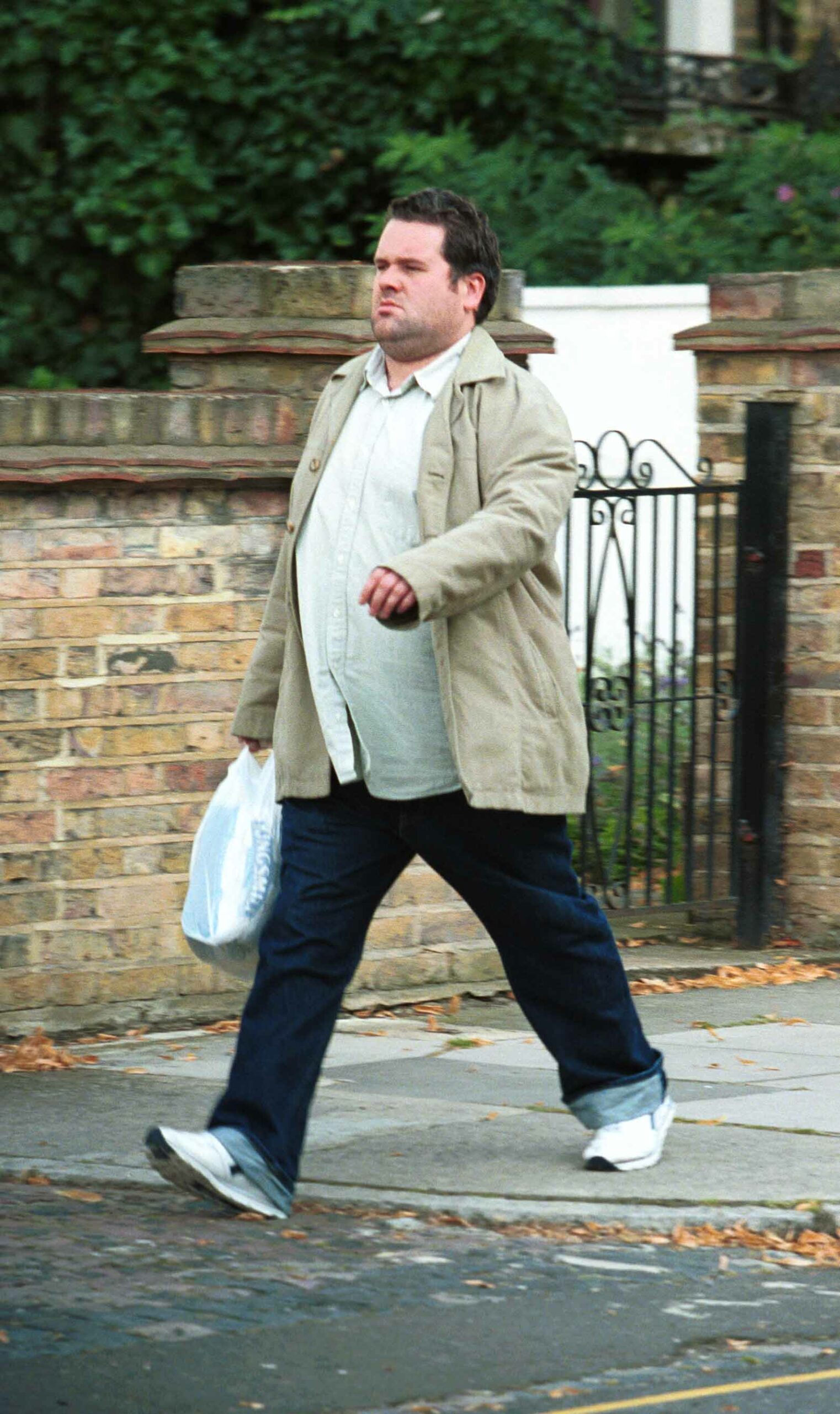 Chris Moyles looking bigger walking down the street
