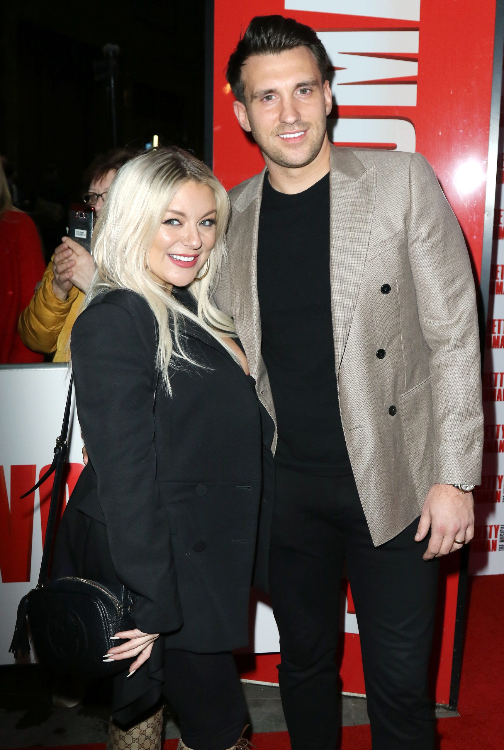 Sheridan Smith and Jamie Horn pose on red carpet together