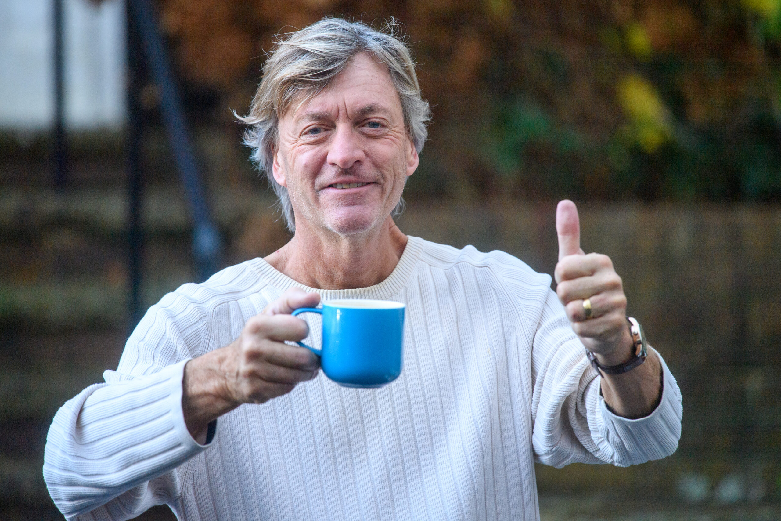Richard Madeley holds tea outside his home