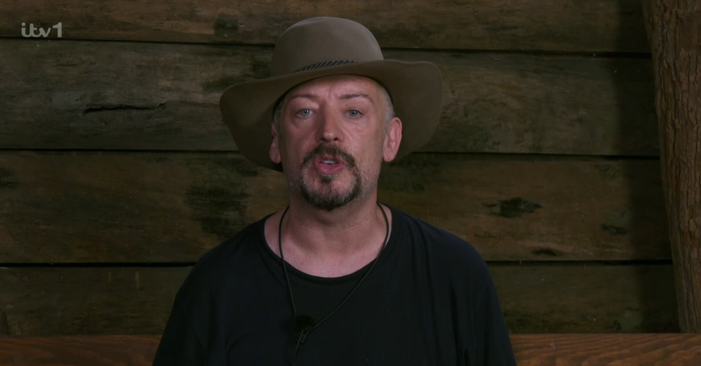 Boy George looking unhappy on I'm A Celebrity