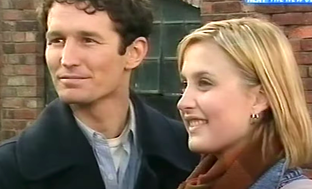 Selina and Steven in Home and Away smile at someone off screen