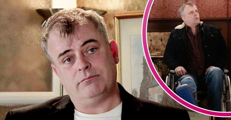 Steve looking worried and in a wheelchair in Coronation Street