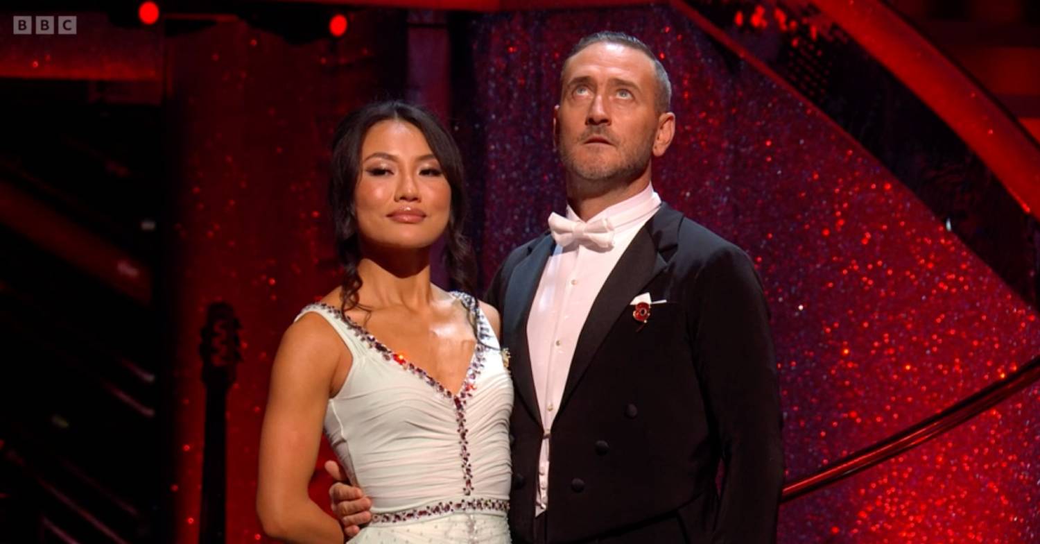 Strictly star Nancy Xu stands with Will Mellor, who looks upwards