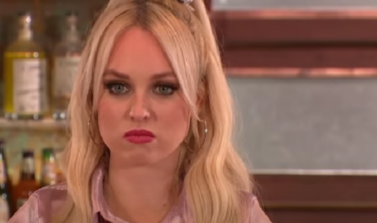 Theresa McQueen looking angry in Hollyoaks