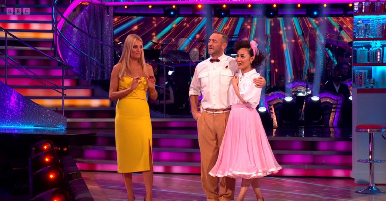 Will Mellor embracing Nancy Xu on Strictly alongside Tess Daly