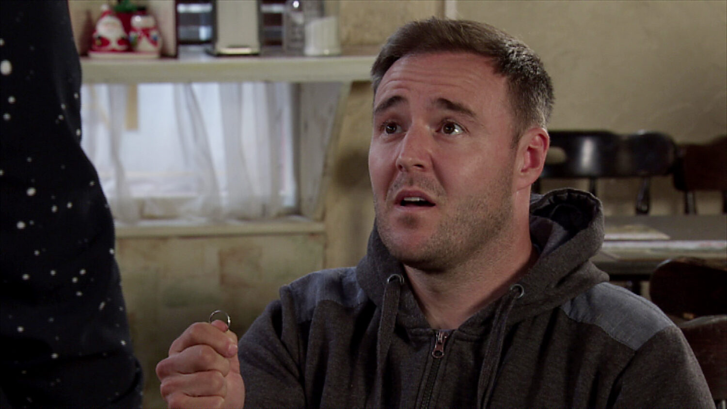 Coronation Street's Tyrone is proposing to Fiz and is holding up a ring