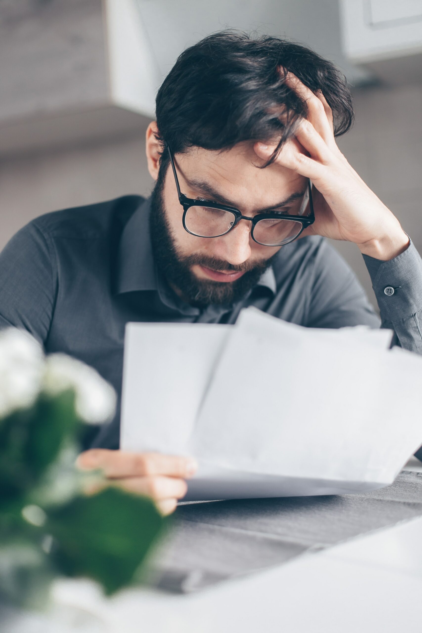 Person stressed over bills