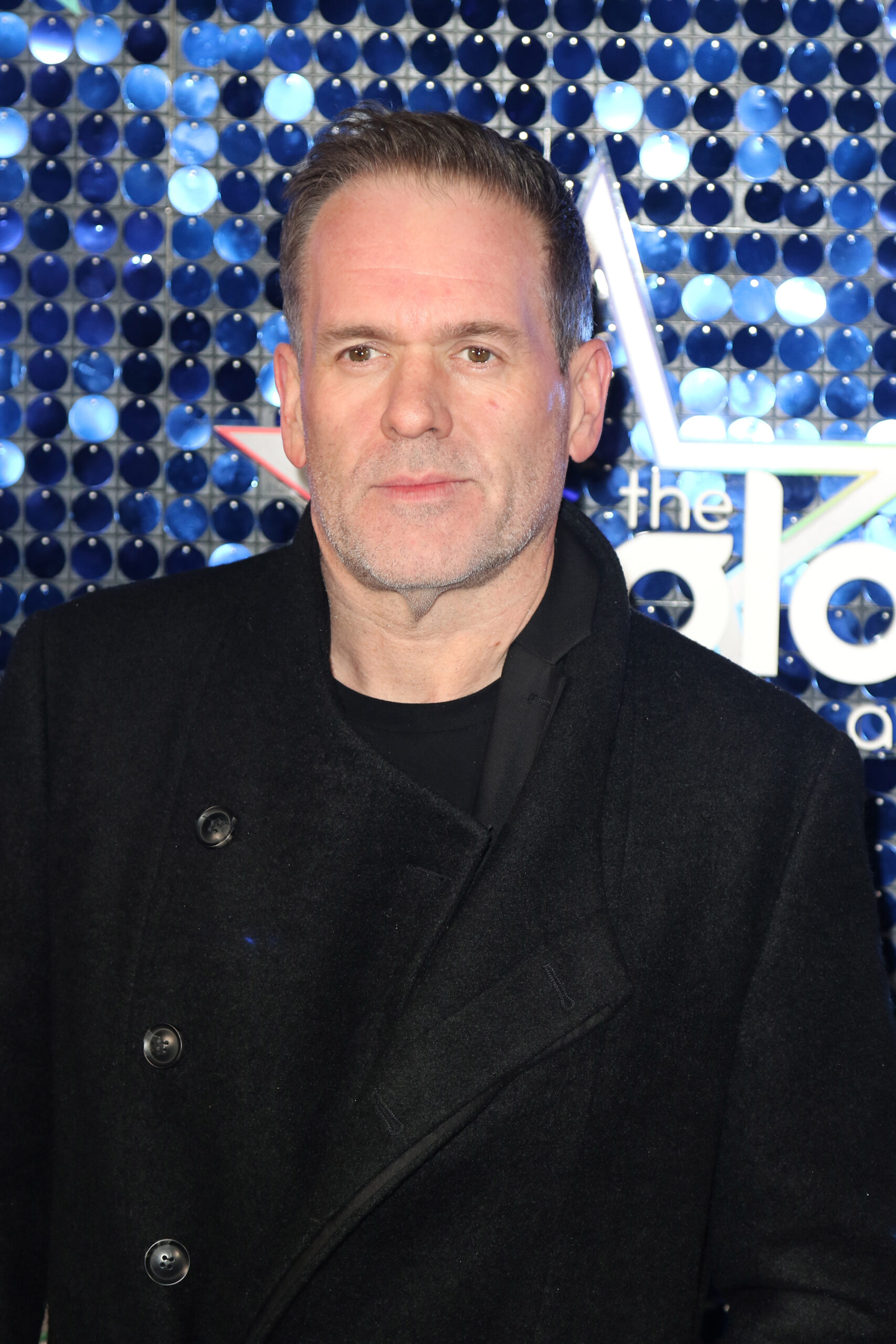 Chris Moyles looking pensive on the red carpet