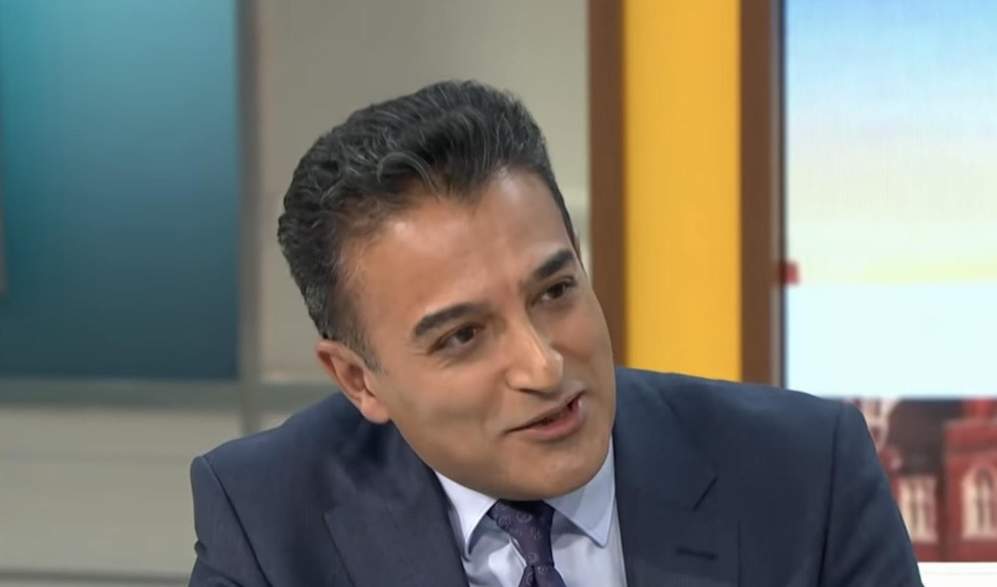 Adil Ray smiles on GMB