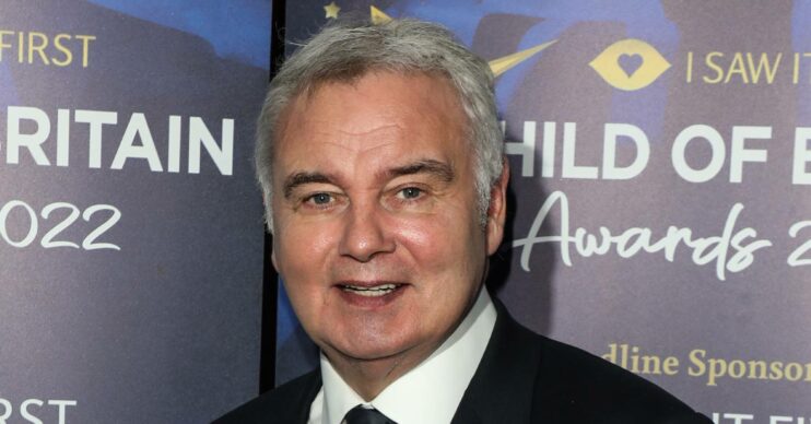 Eamonn Holmes looks towards the camera
