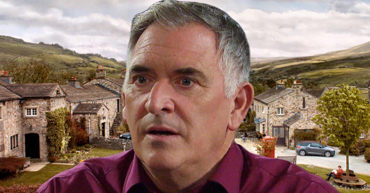 Emmerdale comp image: Bob Hope looks worried on the Emmerdale background